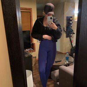 Bluish-purple high rise Lululemon leggings.